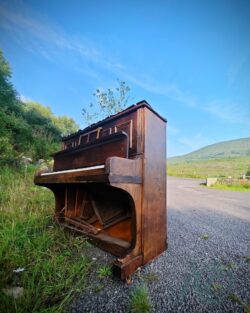 My Piano has been Drinking Old upright piano dumped on the side of the road at the Cousane Gap Dunmanway
